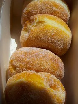 A box of Jam Donuts Closeup Stock Photos