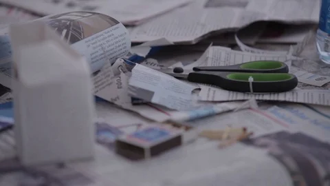 Box of matches, scissors and newspapers on white Stock Footage 86453453