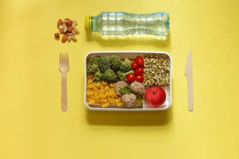 Box with a menu option for lunch. Ready-made lunch for school or office, with Stock Photos