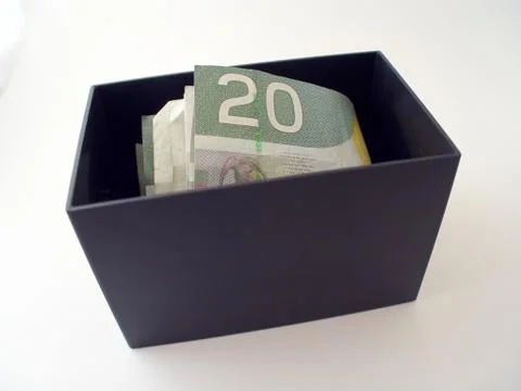 Box with money Stock Photos