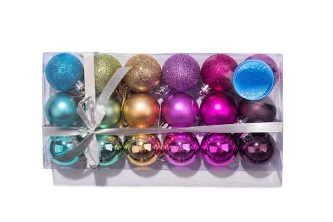 Box of multi-colored baubles. Stock Photos
