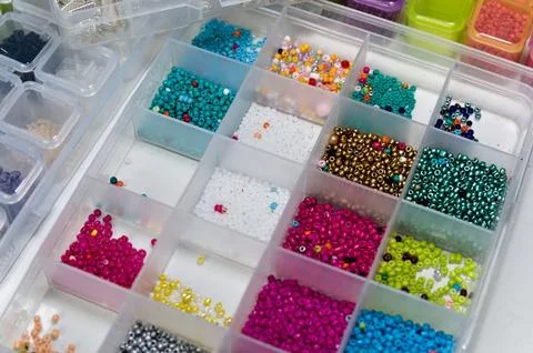 Box with multicolors sorted beads Stock Photos