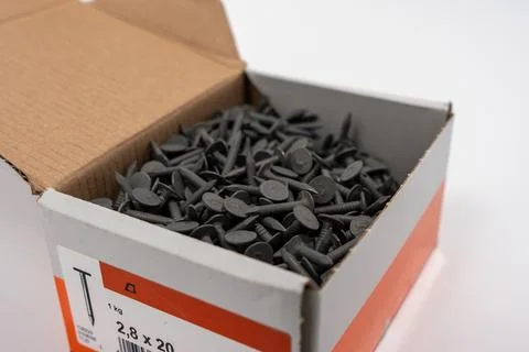 A box of nails for roofing. Stock Photos