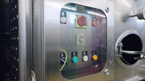 Box with necessary buttons, indicators and regulators on steel tank for wine Stock Footage 306775243