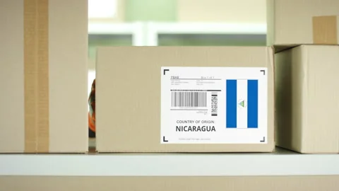 A box from Nicaragua on the shelf Stock Footage 146400968