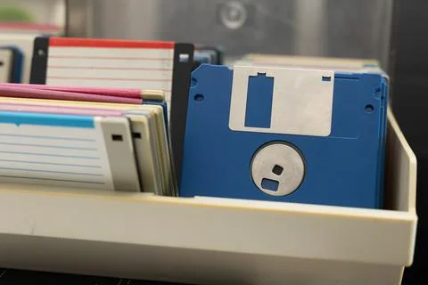 A box of old 3.5-inch floppy disks, colorful floppy disks for 8-bit compute.. Stock Photos