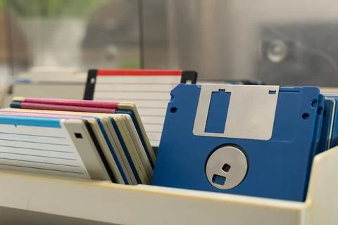 A box of old 3.5-inch floppy disks, colorful floppy disks for 8-bit compute.. Stock Photos