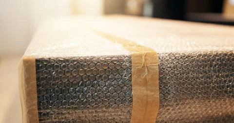 Box, packaging and stock with bubble wrap for ecommerce, inventory and ship.. Stock Photos