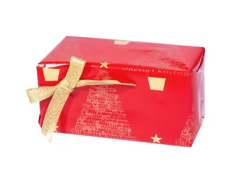 The box is packed in red gift paper with a gold bow,the concept of the holiday Stock Photos