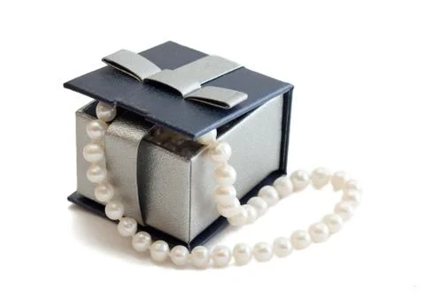 Box with pearls Stock Photos
