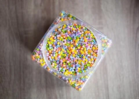 Box with plastic beads Stock Photos