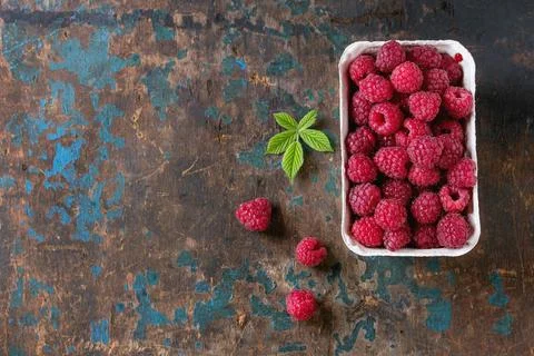 Box of raspberries Stock Photos
