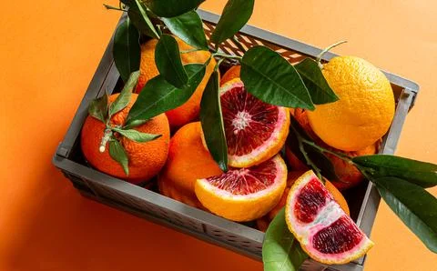 Box with red oranges. Fruit banner. Harvest, abundance, juicy Stock Photos