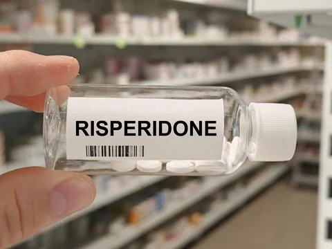 Box of RISPERIDONE tablets on a hospital pharmacy table used to treat Stock-Fotos