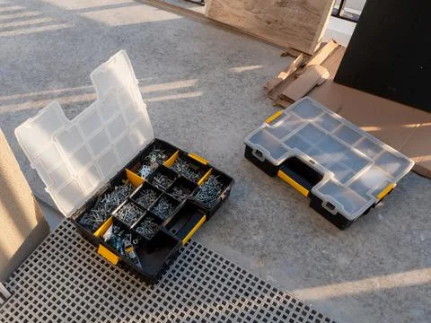 Box with screws - professional tools for the installer Stock Photos