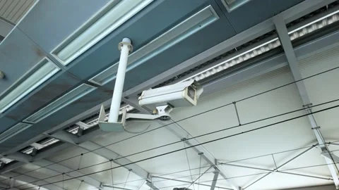 Box Security CCTV Camera Hanging On Modern Building Ceiling Video stock 338386155