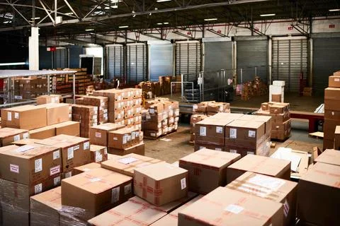 Box, shipping and cargo with empty room of warehouse for logistics, deliver.. Stock Photos