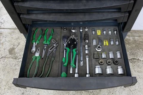 Box with a special tool for auto mechanics in the service station. Profession Stock Photos