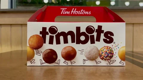 A box of tim hortons timbits doughnuts Video stock 222306802