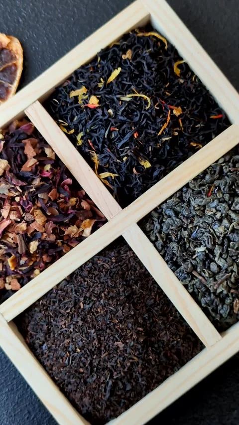 A box of various dry teas, black, green, herbal, and fruit. A set of different t Stock Footage 332767669
