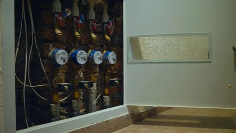 Box with water meter devices in new built residential house Stock Footage 74185616