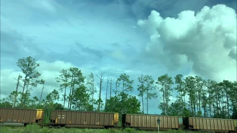Boxcar Train Driving By Clouds 4k 스톡 동영상 211877783