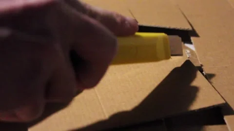 Boxcutter Cardboard Cutting Stock Footage 264702856