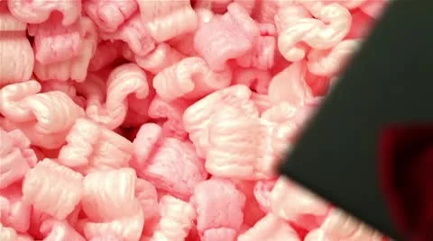 Boxed gift inside packaging material Stock Footage 10735379