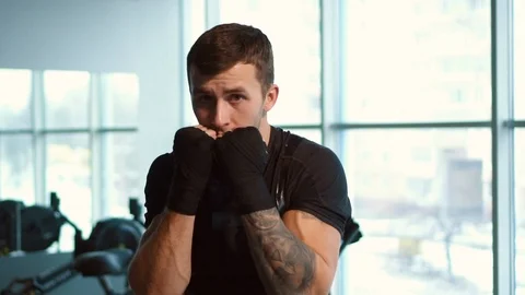 Boxer doing fight with shadow to camera 스톡 동영상 100714004