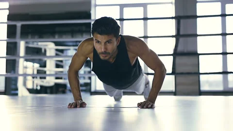 Boxer doing push ups at the boxing ring. Stock Footage 98588154