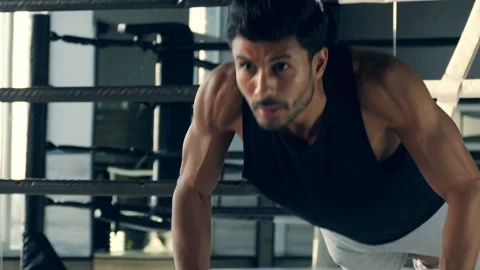 Boxer doing push ups at the boxing ring. Video stock 98872321