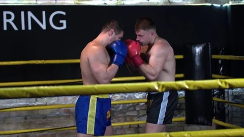 Boxer duck defense knockout to head punch opponent falls HD slow motion video Stock Footage 70386031