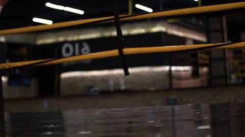 Boxer falling down boxing ring floor after knockout punch HD slow motion video Stock Footage 70387655