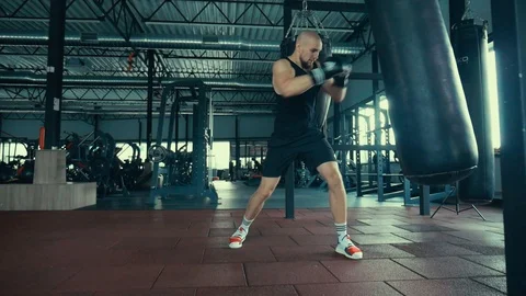 The boxer has a boxing pear. The guy is boxing. Stock Footage 112293957