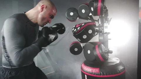 Boxer Heavy Hitting BoxMaster Punching Machine Stock Footage 174927068