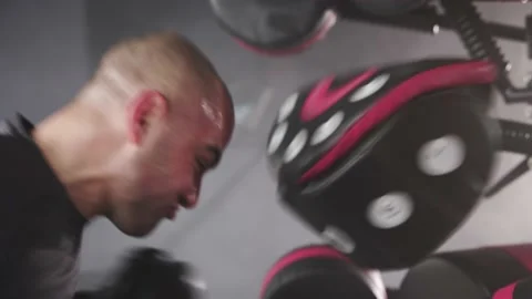 Boxer Heavy Hitting BoxMaster Punching Machine Stock Footage 174927172