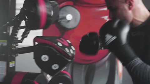 Boxer Heavy Hitting BoxMaster Punching Machine Stock Footage 174927364