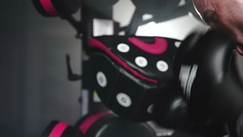 Boxer Heavy Hitting BoxMaster Punching Machine Stock Footage 174927686