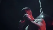 Boxer Hits Punching Bag Stock Footage