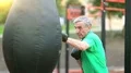Boxer hits punching bag HD Footage