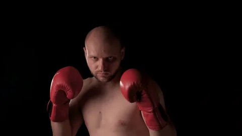 The boxer intimidates the opponent and knocks himself out Stock Footage 139011364