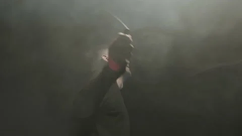 A boxer jumping with a rope preparing to training session. A fighter man Stock Footage 161047837