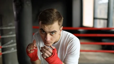 Boxer Man Fights with Shadow at the Ring 動画素材 103754621