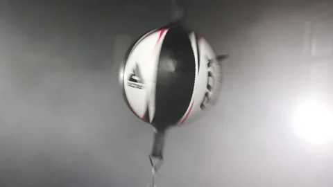 Boxer Man Hitting Speed Bag during Boxing Workout in the Gym (Slow Motion) Stock Footage 174927278