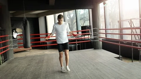 Boxer Man Training with a Jumping Rope 動画素材 103753814