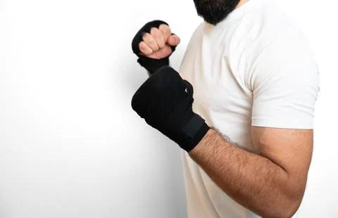 Boxer posing with wrapped hands isolated on white background training concept Stock Photos