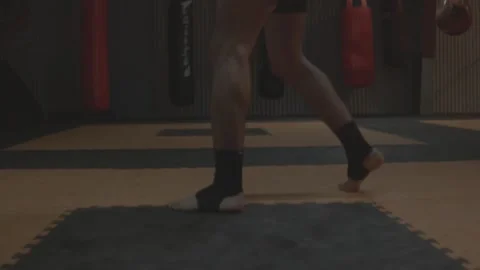 Boxer Practicing Footwork in Gym Stock Footage 146985993