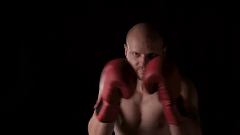 The boxer prepares fight. Hitting each other gloves. Slow motion Video stock 138988430