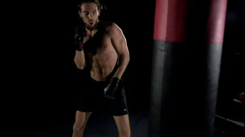 Boxer punch a punching bag. Stock Footage 92180998
