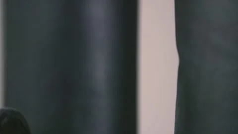 Boxer punching a bag Stock Footage 89854136